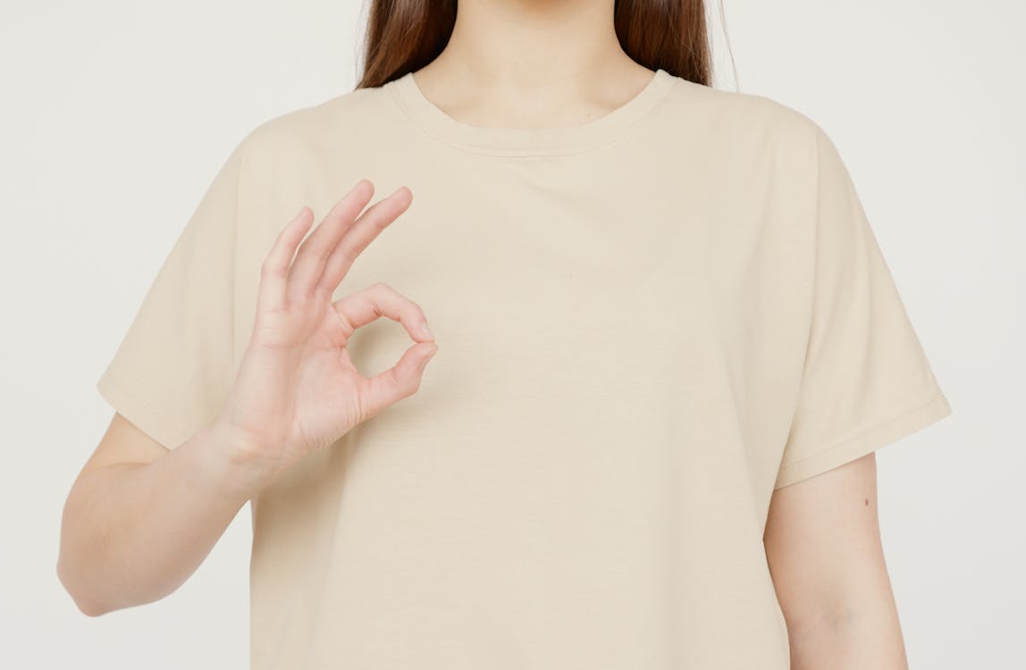 Free A Person Wearing Beige Shirt Stock Photo