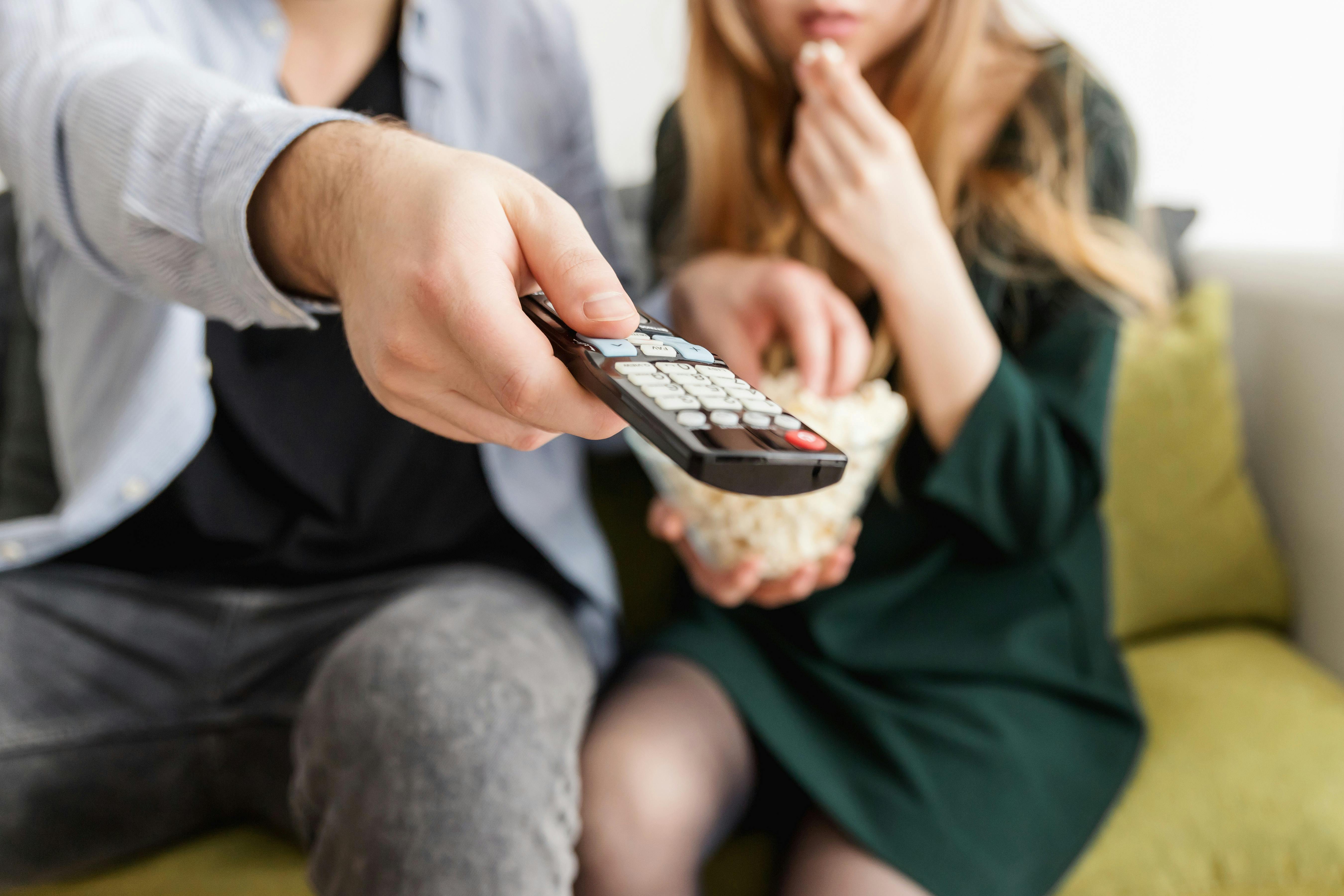 Free Man Holding Remote Control Stock Photo