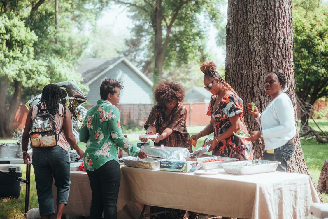Free People During an Outdoor Social Gathering  Stock Photo